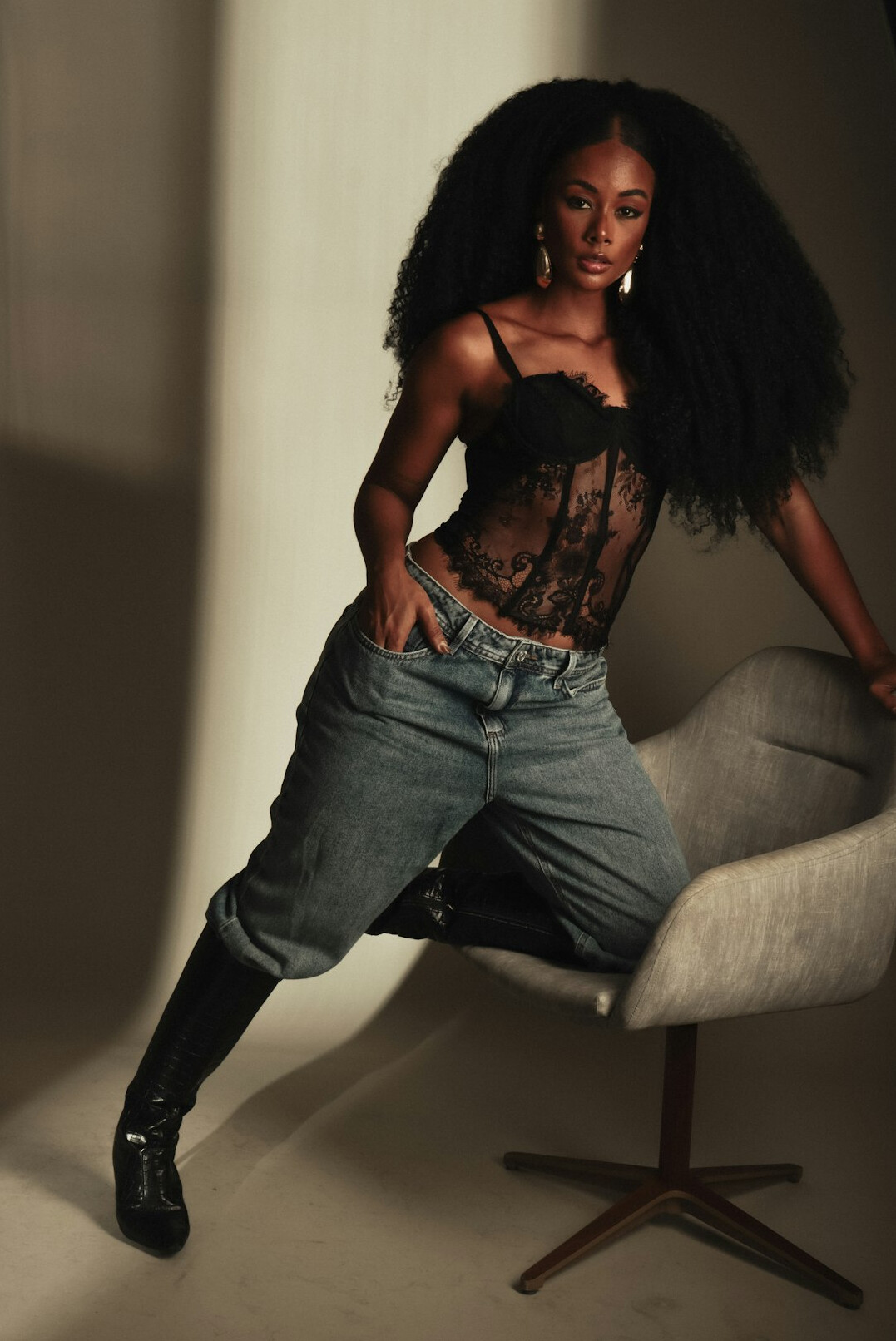 Portrait of an Afro-Brazilian woman smiling in a studio setting